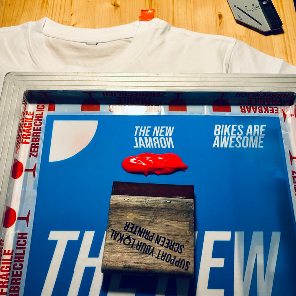 The new normal (white with neon red print)